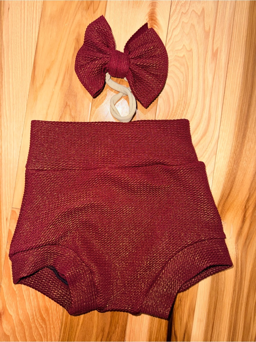 Bummies size 9-12 month with matching bow on nylon